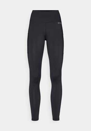 Sorte leggings med høy midje, glatt tekstur og sidelommer. Har minimal merking på midjebåndet. Laget av elastisk stoff.