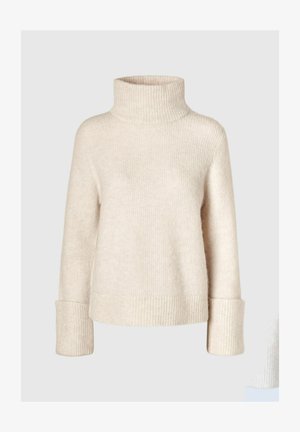 Cream-colored turtleneck sweater with ribbed texture, loose fit, and wide cuffs. Soft material with slight sheen; minimalist design.