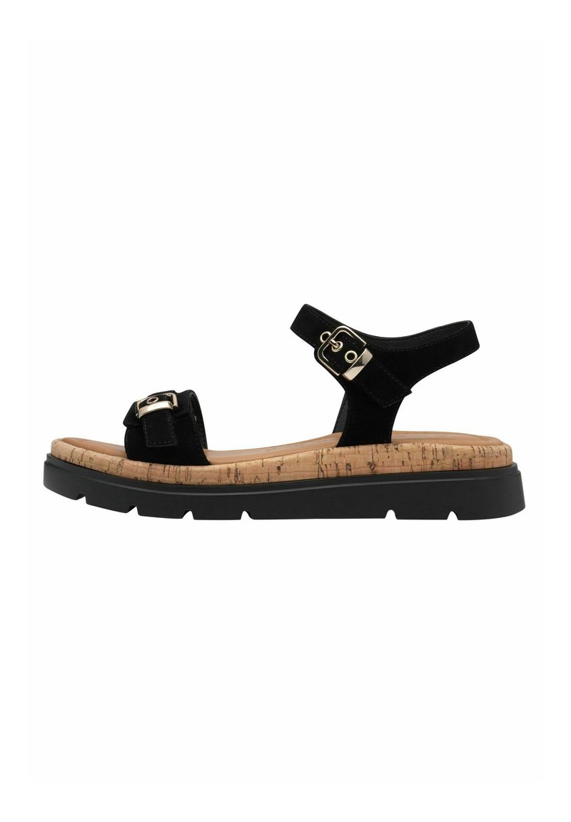 Black suede sandal with cork footbed, adjustable strap, gold buckles, and black rubber sole.  Features a flat design and casual style.