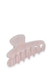 Rosa Kunststoff-Haarspangenclip mit glatter Textur, ausgestattet mit Design in Übergröße einer Schleife und gleichmäßig verteilten Zacken zum Festhalten von Haar.