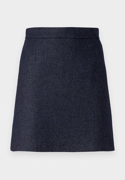 Dark blue mini skirt made of textured fabric, featuring a clean waistband and subtle side pockets. Hem is straight and finished.