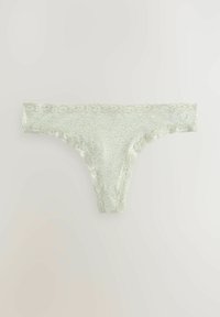 Lace-trimmed string gemaakt van lichtgroene stof met een stippenpatroon; heeft gegolfde randen en een gladde textuur.