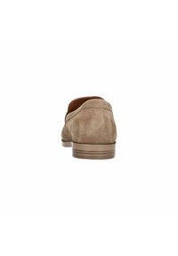 Brown suede slip-on shoes with a rounded heel, featuring a smooth texture and minimalistic design. Rubber sole with light-colored accents.