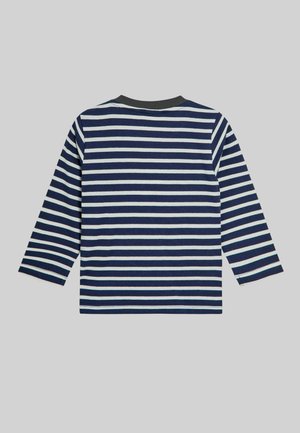 Tumši zila un balta svītraina garām piedurknēm krekls ar pelēku apaļu apkakli. Kokvilnas materiāls, taisna apakšmala un sānu šķēlumi apakšējās malās.