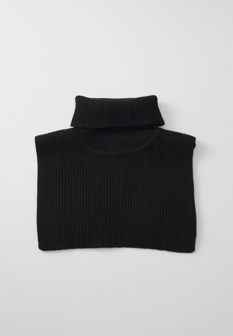 Sort ribbet strikket ærmeløs turtleneck med høj fold-over krave. Har struktureret stof og en boxy form.