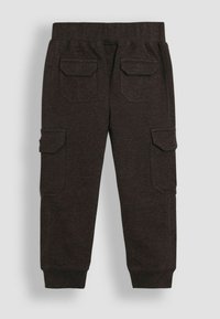 Donkergrijze cargobroek met een elastische tailleband, ribbed manchetten en vier zakken, gemaakt van een zachte, gestructureerde stof.