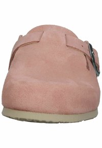 Pink suede clogs with a closed toe, side buckle detail, and a beige rubber sole, featuring a soft texture and simple design.