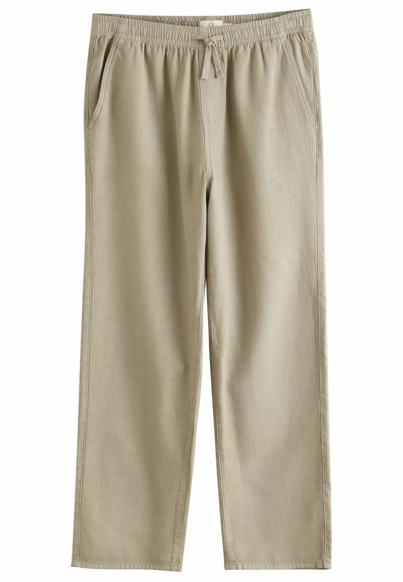 Beige relaxed-fit pants with an elastic waistband and drawstring. Features two side pockets and a textured fabric. Straight leg design.