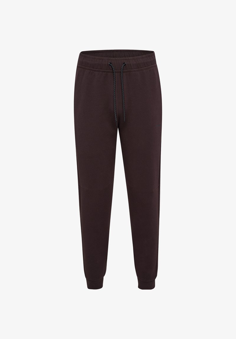 Donkerbruine sweatpants met een elastische tailleband, trekkoorddetail, zijzakken en taps toelopende pijpen. Gemaakt van zachte stof met een gladde textuur.