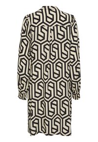 Vestido de patrones negro y crema con mangas largas, diseño geométrico y puños fruncidos. Confeccionado en tela ligera con un corte holgado.