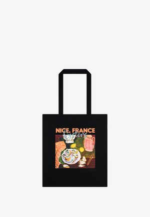 Sac cabas noir avec une illustration d'une table dressée comprenant des huîtres, des citrons et de la céramique, intitulé "Nice, France Oysters" en texte orange et bleu.