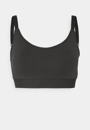 Zwarte katoenmix bralette met een ronde halslijn, verstelbare banden en een brede, gladde band aan de onderkant. Geen zichtbare patronen of hardware.