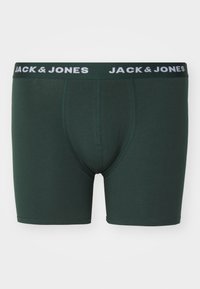 Dunkelgrüne Boxershorts aus weichem Stoff, mit einem weißen elastischen Bund, auf dem "JACK & JONES" mehrfach wiederholt wird. Glatte Textur, keine Muster.
