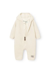 Cremfarbener, strukturierter Fleece-Schneeanzug mit Kapuze, Frontreißverschluss und einem kleinen Etikett am Unterschenkel. Das Design bietet lange Ärmel und Fußteile.