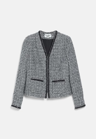 Veste en tweed noir et blanc à manches longues, devant ouvert, deux petites poches avant et bordures noires le long des bords et des poignets.