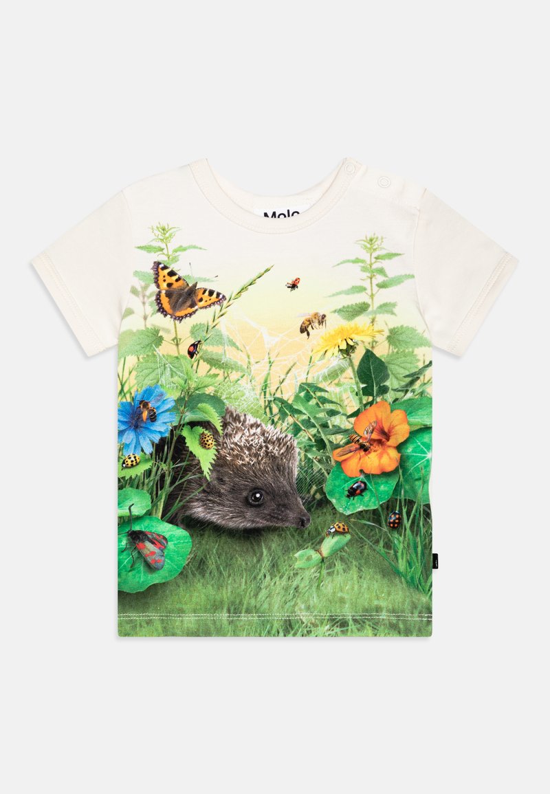 T-shirt a maniche corte in cotone crema con un riccio circondato da fiori colorati, farfalle e vegetazione, con stampa dettagliata.