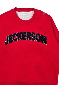 Felpa rossa in cotone con il testo ricamato nero "JECKERSON" sulla parte anteriore e bottoni sulla spalla per una vestibilità più semplice.