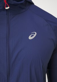 ASICS ROAD PACKABLE JACKET - Veste coupe-vent - blue expanse