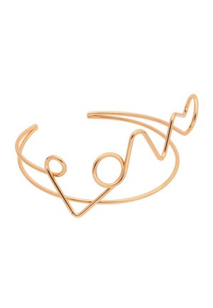 Kultasävyinen avoin kalvosinranneke, joka on muotoiltu yhdestä jatkuvasta langasta sydän- ja sydämenlyöntiviivakuvion muodostamiseksi.