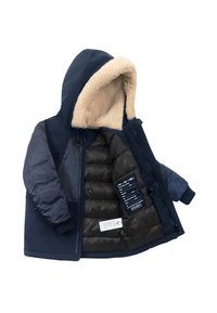 Giacca imbottita blu navy con cappuccio foderato in pelliccia sintetica; presenta un interno trapuntato nero con etichetta e istruzioni per la cura all'interno.