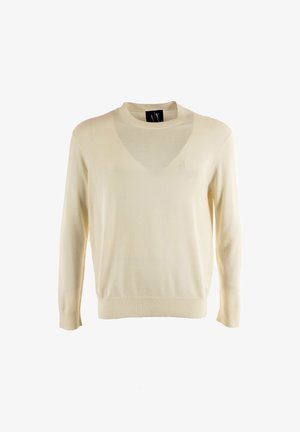 Crèmekleurige trui met lange mouwen en ronde hals, met geribde manchetten en zoom, voorzien van een klein geborduurd logo op de borst.