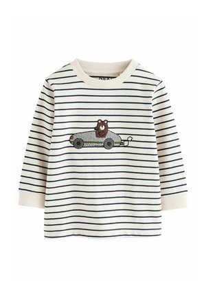 Striped long-sleeve top in cream and navy, featuring an embroidered bear in a car design. Soft cotton material with ribbed collar and cuffs.