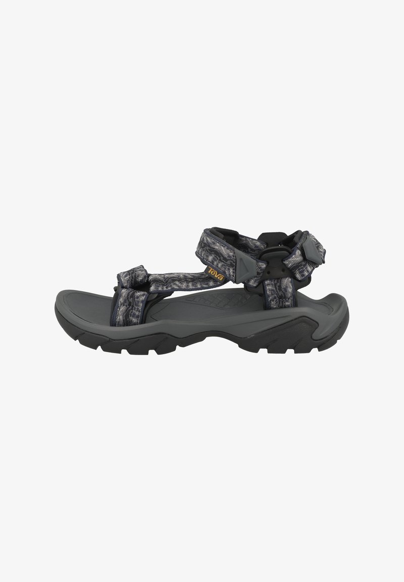 Sport sandals with a gray rubber sole, patterned textile straps, adjustable buckles, and a textured footbed for grip and comfort.