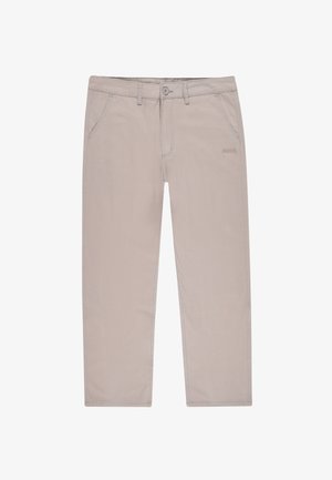 Beżowe bawełniane spodnie z zapięciem na zamek, przednimi kieszeniami i subtelnym logo po lewej stronie. Prosty krój nogawki z wykończeniami w postaci szwów.