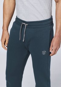 Chiemsee MIT PRINT - Tracksuit bottoms - total eclipse