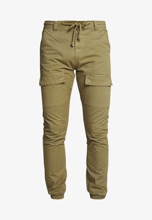 Khaki cargo pants with elastic cuffs, drawstring waist, and two large side pockets. Made of cotton blend, featuring smooth texture.