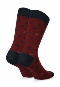 Bordowe skarpetki z niebieskimi akcentami, z powtarzającym się wzorem motyli w różnych odcieniach. Żebrowany mankiet i wzmocniona pięta.