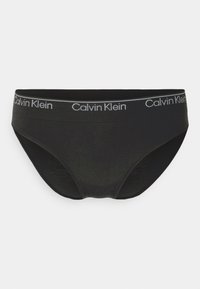 Mutande nere in cotone con una morbida fascia elastica che presenta la scritta "Calvin Klein" in bianco. Texture liscia e design minimalista.