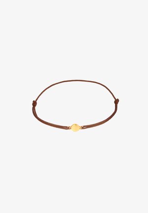 Brown cord bracelet featuring a circular gold accent at the center, with adjustable sliding knots on either side.