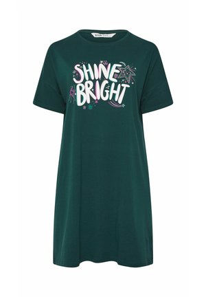 Mørkegrøn kortærmet kjole med teksten "SHINE BRIGHT" og farverig stjerne- og gnistgrafik på fronten.