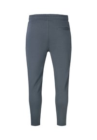 Dark gray tapered sweatpants with elastic waistband and single welt pocket on the back right side shown from the rear.