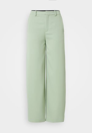 Light green wide-leg pants made from smooth fabric. Features a flat front, belt loops, and a tailored fit with no visible hardware.