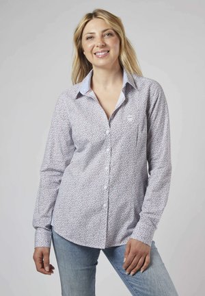 Chemise à manches longues à boutons en tissu léger avec un petit motif floral, des accents de col bleu et une poche poitrine. Coupe normale.