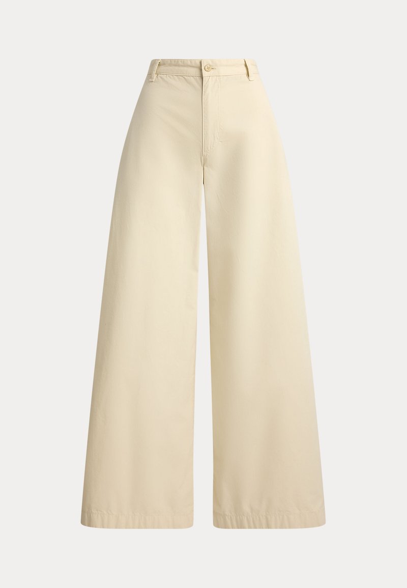 Pantalon beige à jambes larges en coton, taille haute, fermeture avant par boutons, et coutures nettes le long des bords.