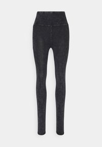 Svarta leggings med hög midja, med en texturerad, något blek look. Slät tyg med inga synliga sömmar eller accenter.