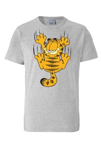 Camiseta de algodón gris con un gato de dibujos animados con rayas naranjas, garras extendidas y contornos negros audaces. Diseño clásico de cuello redondo.