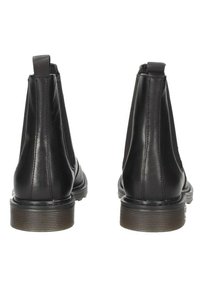 Botas Chelsea de cuero negro con paneles laterales elásticos, punteras redondas y suelas texturizadas para una mayor tracción. Presentan acentos de costura mínima.