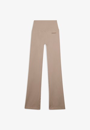 Beige joogapüksid laia elastse vöökohtaga, flare-jala säärega ja siledast tekstuurist. "FREDDY" logo on tagasi õrnalt trükitud.