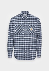 Heren overhemd met lange mouwen in een marineblauw ruitpatroon, van een katoenmix. Voorzien van twee borstzakken met diagonale strepen en een merkpatch.