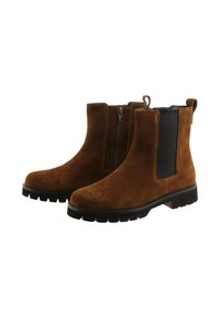 Brune ruskind ankelstøvler med rund tå, lynlås i siden, elastisk panel og struktureret sort gummisål med et mønstret accent.