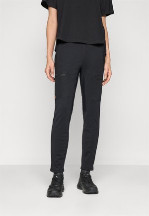 Black athletic pants with a slim fit, featuring two front cargo pockets, textured knee panels, and an elastic waistband.
