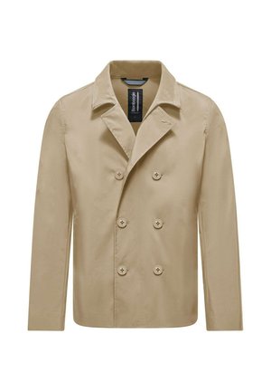Giacca beige doppiopetto con colletto a revers, maniche lunghe e sei bottoni. Tessuto liscio, vestibilità su misura e design casual.