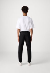 GAP SLIM PERFORMANCE STRETCH - Pantaloni chino - true black