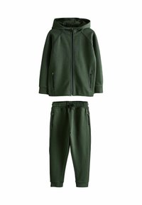 Grønne zip-hoodie med hætte og lynlåslommer, parret med matchende joggerbukser med elastisk talje og lommer.