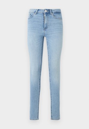 Lyseblå denim skinny jeans har en frontlukkning med knapp og glidelås, fem lommer og en lett falmet finish for tekstur.