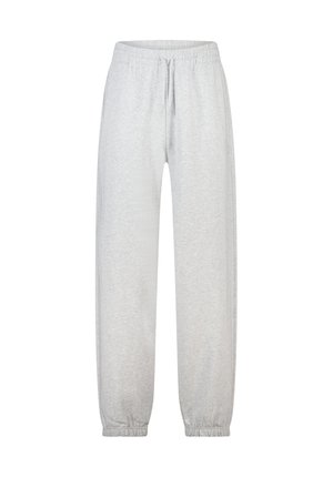 Pantalones deportivos grises hechos de tela suave con cintura elástica y puños ajustados, con un corte holgado y sin bolsillos visibles.